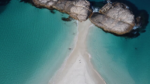 Aerial picture of Wylie bay rocks in Esperance. 2 beaches next to each other. Blue and shallow water. Very beautiful and calm landscape. Walk in the sand between two incredible beaches.