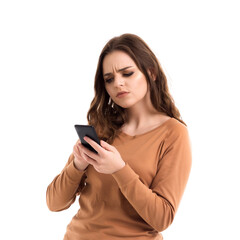Fototapeta premium The girl is talking on the phone. Online communication.