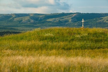 Christianity Crosses And Empty Tomb With Crucifixion At  field