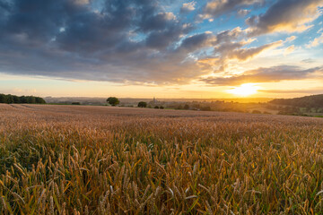 Colourful sunrise in the only Dutch mountain village located in the south of Limburg, with a view...
