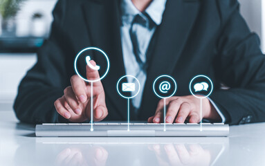 Customer support, hotline ,Contact us, people connection. woman using computer keyboard with the email, call phone, address, Chat message icons.