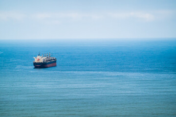 Industrial ship in blue sea