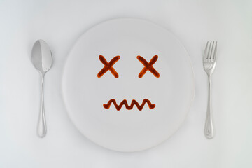 Smiling faces sauce on a white plate.Smiling symbol. Enjoy eating concept.
