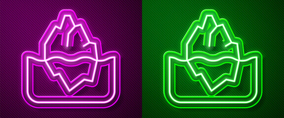 Glowing neon line Iceberg icon isolated on purple and green background. Vector