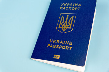 Passport of a citizen of Ukraine on a blue background close-up