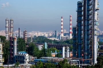 Naklejka premium Refinery oil and gas pipelines constructions. Industrial background
