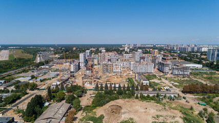 Fototapeta na wymiar Drone aerial view cityscape modern building Residential complex Nice town. Construction of residential premises. Kyiv capital of Ukraine