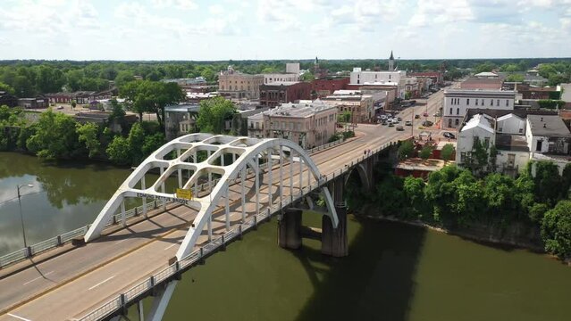 Edmund Pettus bridge in Selma, Alabama with drone video moving up to skyline.