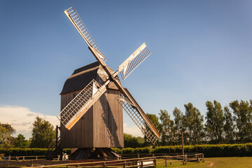 Fototapeta na wymiar Coastal old windmill