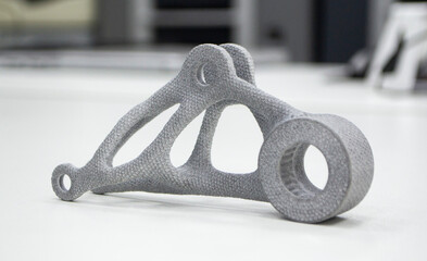 Gray model printed on 3D printer in laboratory office. Object printed on 3D printer from plastic....