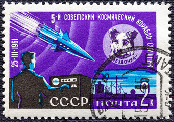 Postage stamp USSR 1961.Stamp printed by Russia, shows Dog Zvezdochka and Sputnik, circa 1961