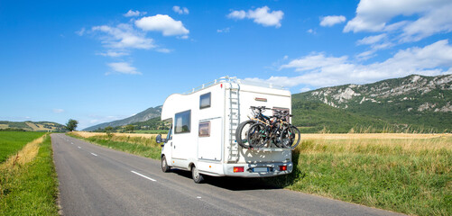 Motor home on the road- road trip,  family holiday,  travelac