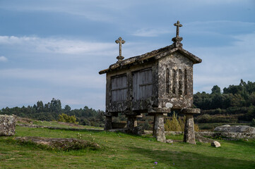 Fototapeta premium View of the granaries (espigueiros) in the historic village of Lindoso, Portugal.
