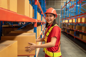 Women warehouse staff worker manage factory products goods and shipping to customer.