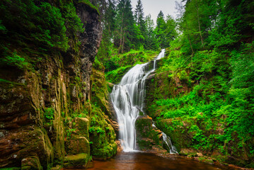 A beautiful Kamienczyka waterfall in the Karkonosze Mountains, Poland