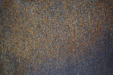 Rust texture. Rough rusty metal surface. Black orange. Dark grunge background with space for...