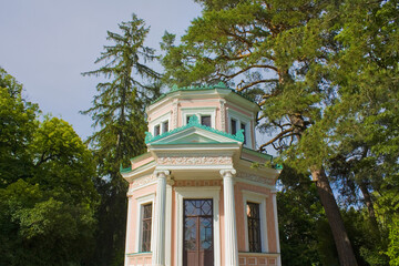 Pink summer house on the Island of Anti-Circe in National dendrological park 