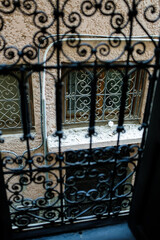 Black metal fence on an indoor window handmade in moroccan style