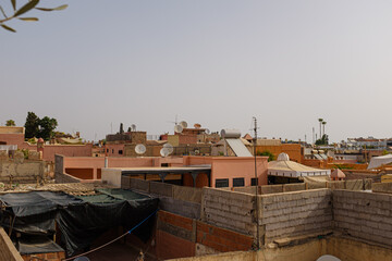 Fototapeta na wymiar Marrakesh urban skyline with parabolic antenna on a blue sunny sky