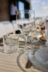Glass goblets on the table. Glass goblets for wine or champagne 