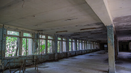 Inside destroyed abandoned building House of Culture Energetik in ghost city Pripyat after...