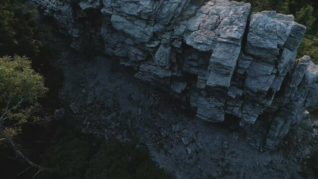 Fly around massive rock gate in the forest