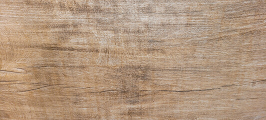 light rustic wood background with dark veins on natural panel