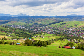 Fototapeta na wymiar Panoramic view on Yasinia village. Carpathian mountains, Ukraine.