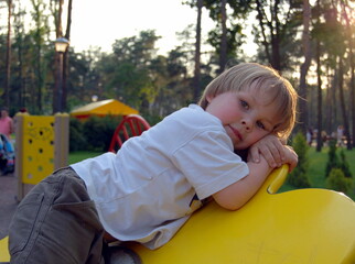 little child playing on playground