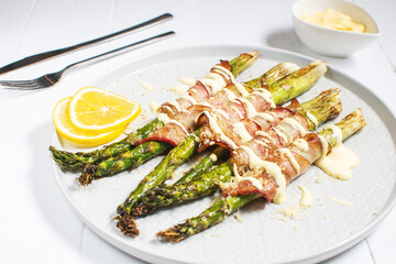 Grilled green asparagus wrapped with bacon. Ketogenic diet. Healthy food, diet