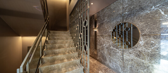 Modern marble interior of entrance hall in luxury residential building