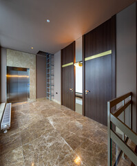 Modern marble interior of entrance hall in luxury residential building