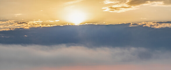 Panoramic shot of morning sky with sun