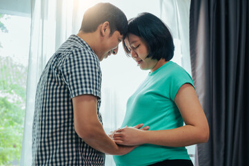 Fototapeta premium pregnant woman with her husband 
