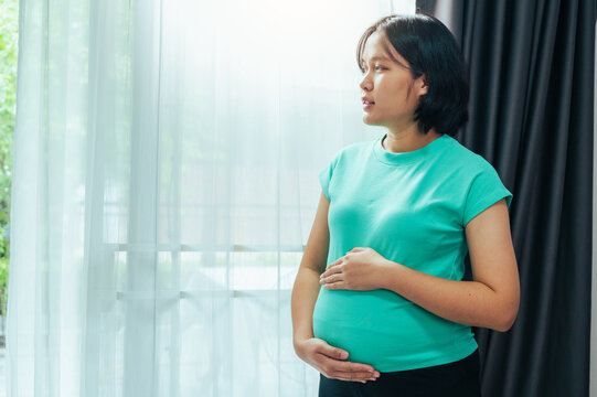 pregnant woman with positive emotions 