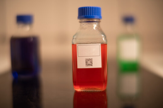 Chemical Bottle With Blank Sticker In Chemistry Lab