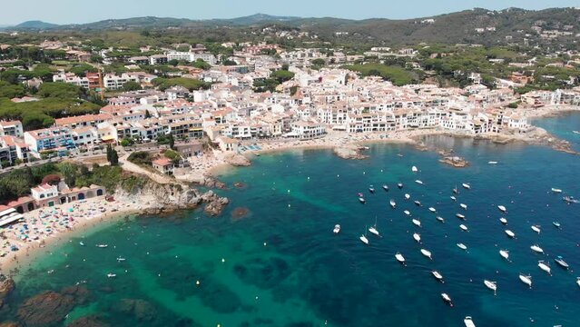 flight toward the picture perfect Spanish town of Calella de Palafrugell, Costa Brava, Cataluña, Spain.  Warm waters and small town life make for an amazing summertime destination