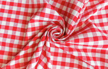 Twisted plaid fabric. Classic drawing. Beautiful curl.