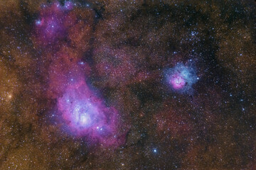 The Lagoon nebula and the Trifid nebula in the center of the milky way