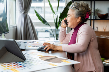 old senior asian femael woman retired people entrepreneur business owner working cheerful at...