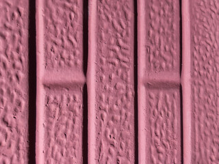 wall texture. purple cement wall surface detail. an old building concrete wall with a rough texture and holes or pores suitable for the background