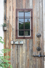 Wooden front door of a home. Old Wooden Door.