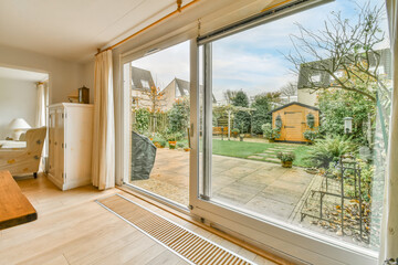Window overlooking the back of the house