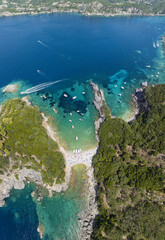 Aerial view of Limni Beach Glyko, on the island of Corfu. Greece. Where the two beaches are connected to the mainland providing a wonderful scenery. Unique double beach. Kerkyra
