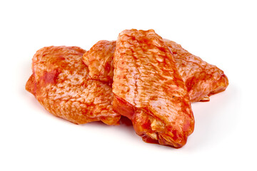 Marinated Buffalo chicken wings in red sauce with lettuce salad leaf, isolated on white background.