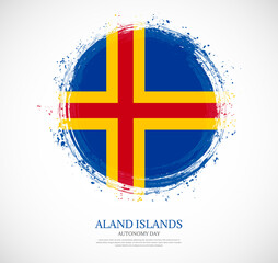 Creative circular grungy shape brush stroke flag of Aland Islands on a solid background