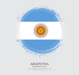 Creative circular grungy shape brush stroke flag of Argentina on a solid background