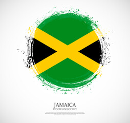 Creative circular grungy shape brush stroke flag of Jamaica on a solid background