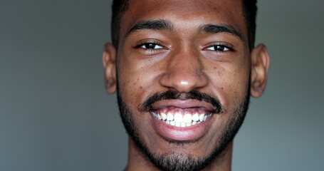 Friendly black African man looking at camera smiling
