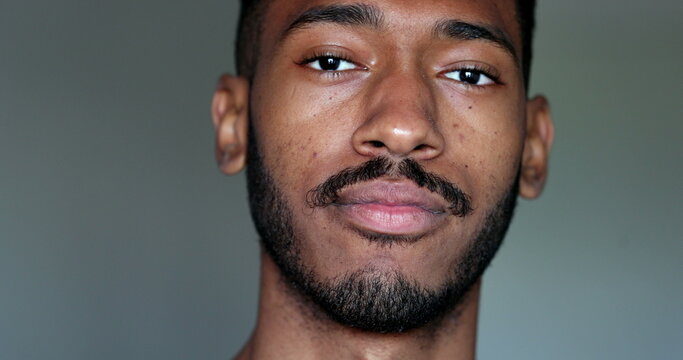 Friendly African american male portrait face close-up